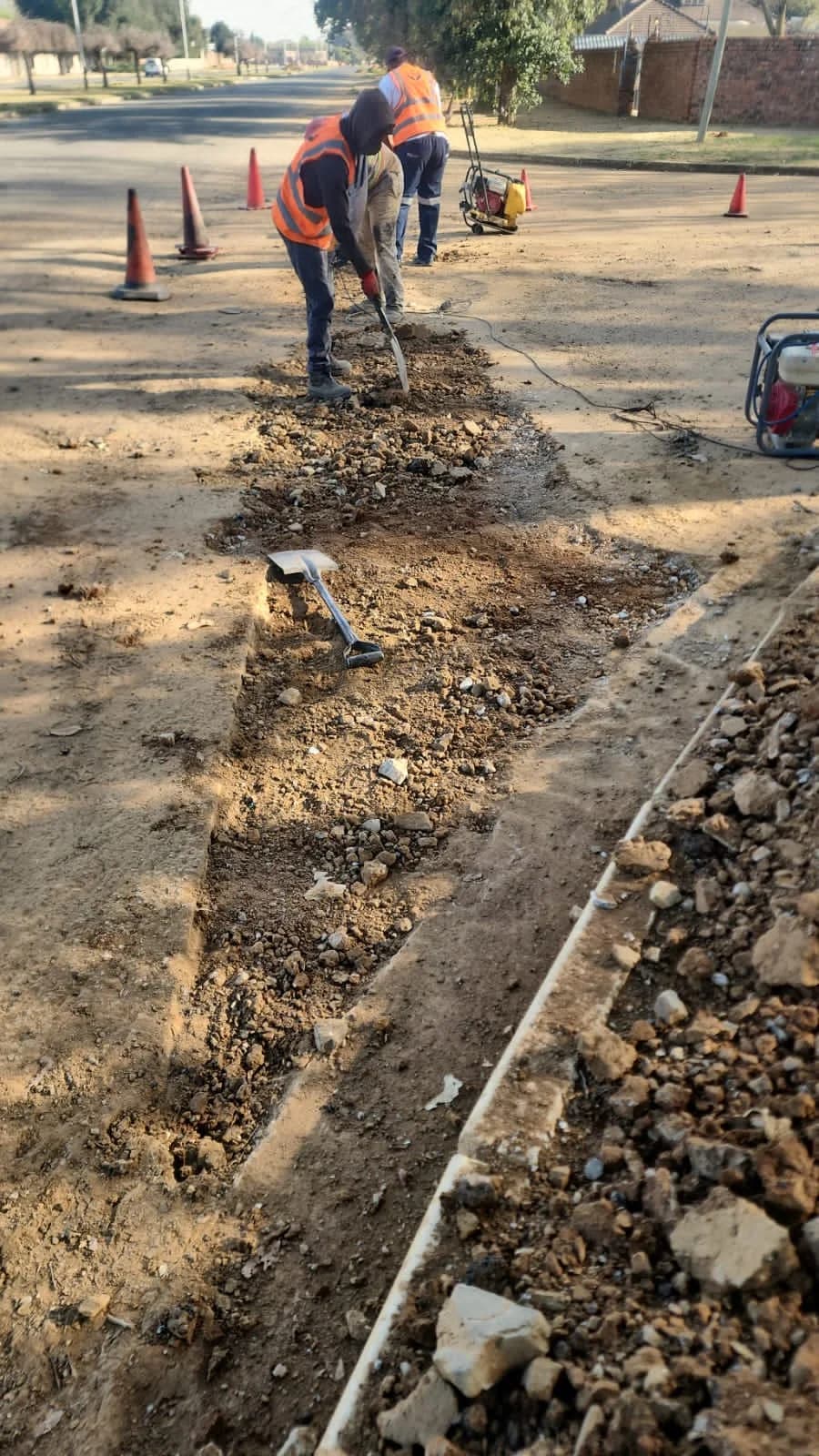 Excavating a road surface by Seldariah Trading