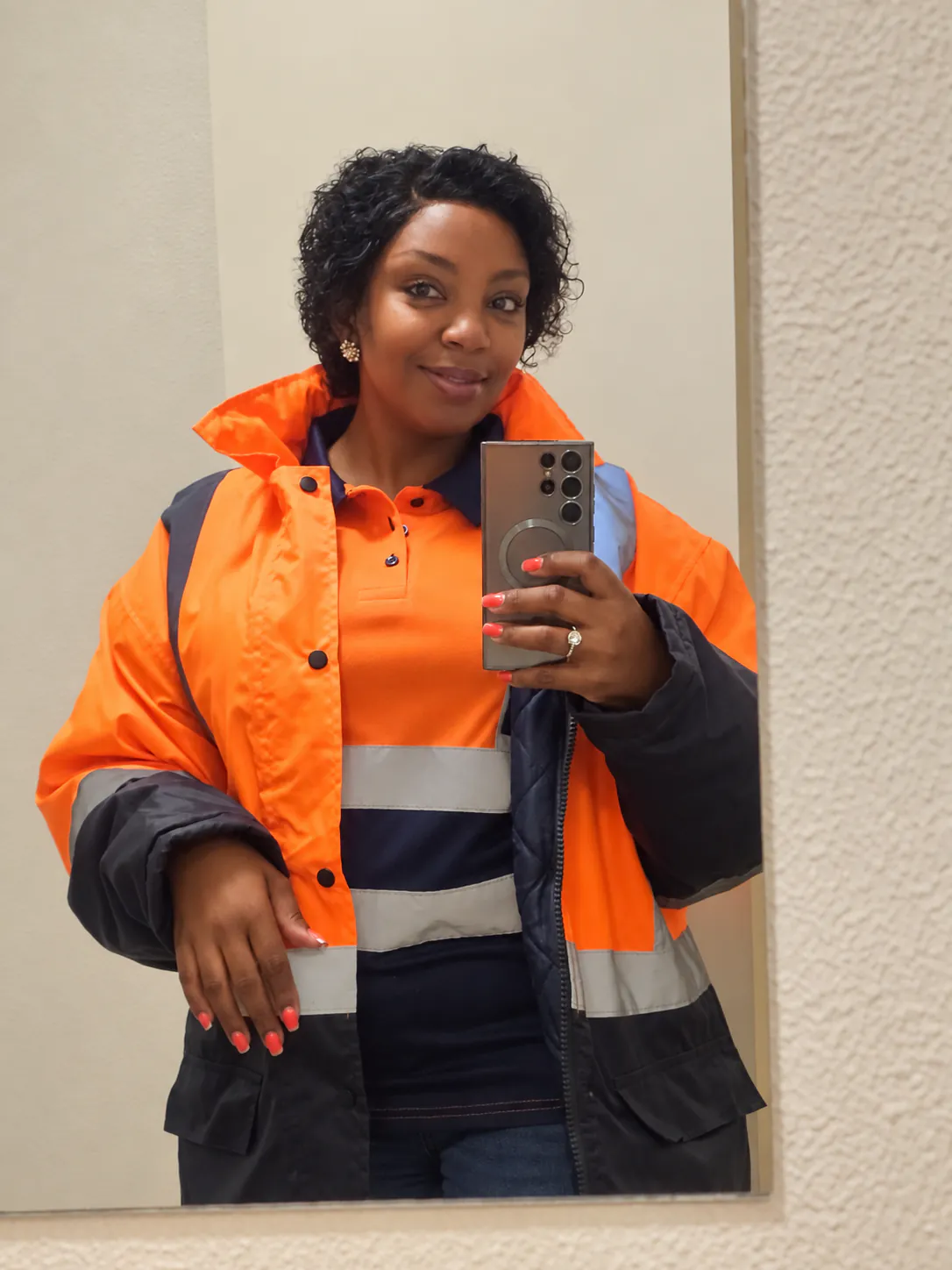Pulane Buti, founder and director, wearing high-visibility site clothing